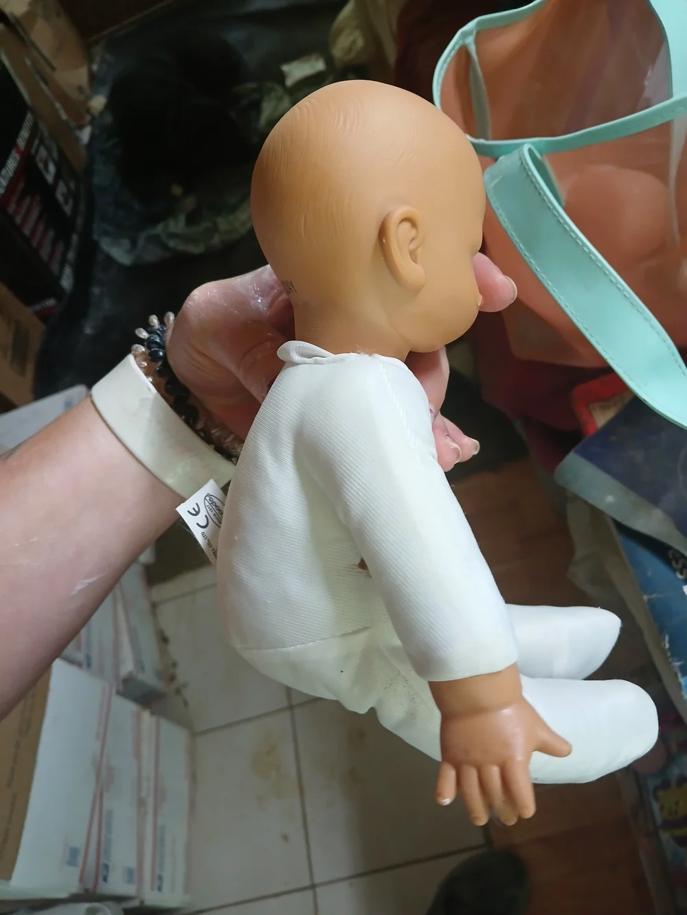 Uneeda baby doll with a soft cloth body and vinyl limbs